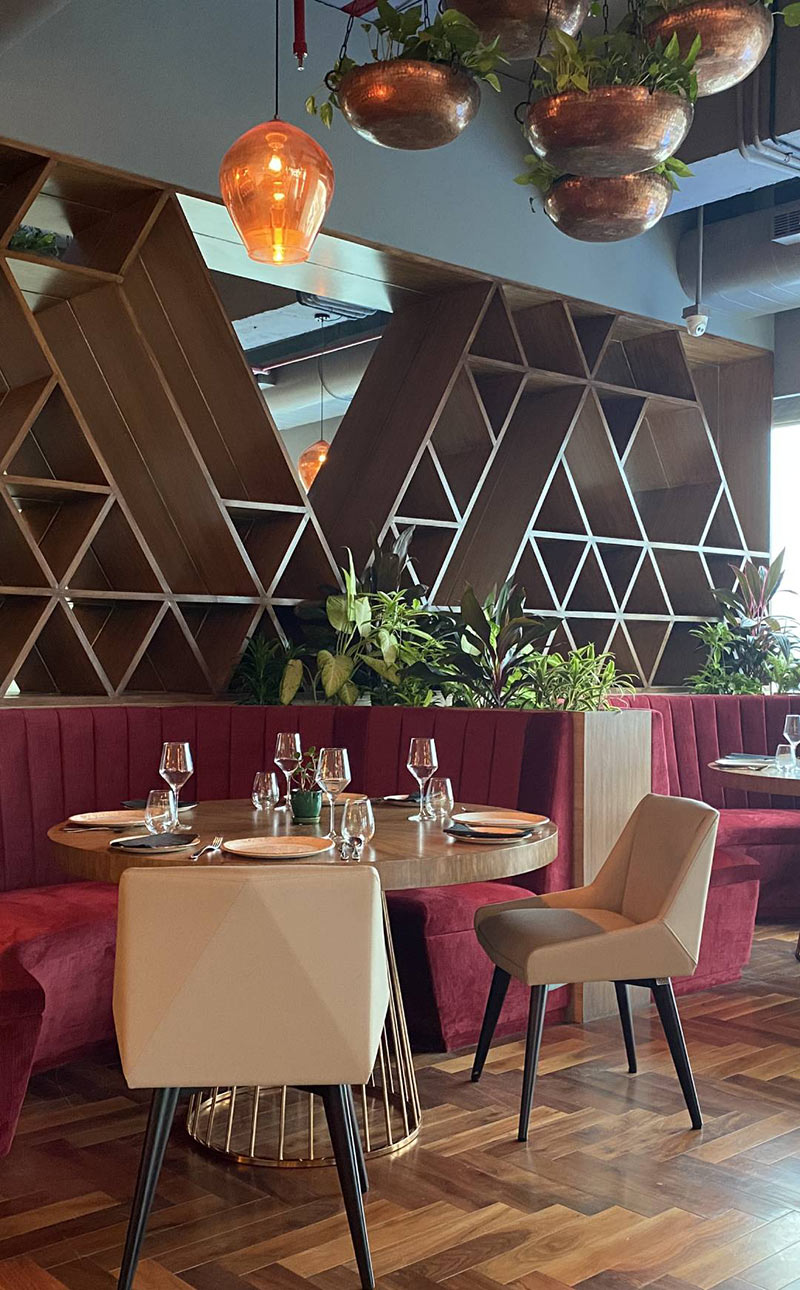 Coalesce dining area offering globally inspired cuisine at The Quorum Mumbai